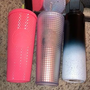 All three starbucks cups